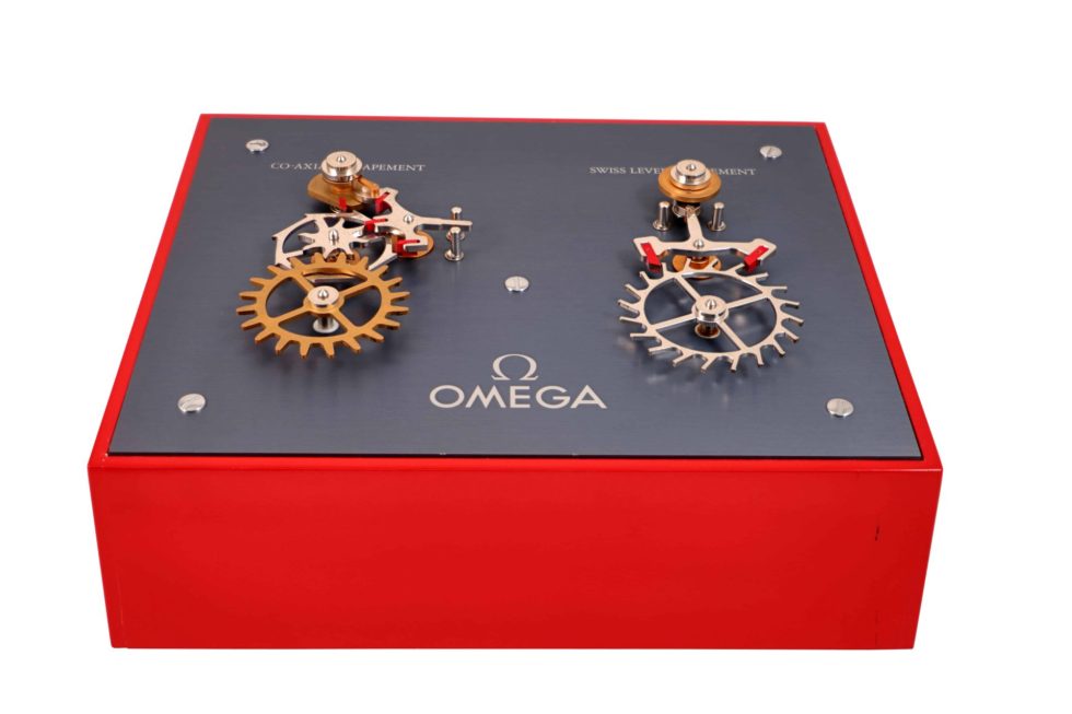 Omega Moving Display Co-Axial Escapement VS Swiss Lever Escapement Machine - Baer & Bosch Auctioneers